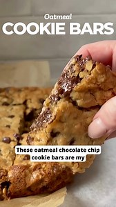 Thick and chewy Oatmeal Cookie Bars are a great treat for a crowd, potlucks and parties. They have the flavor you love from a great oatmeal chocolate chip cookie, baked into easy and delicious bars! | Tastes Better From Scratch