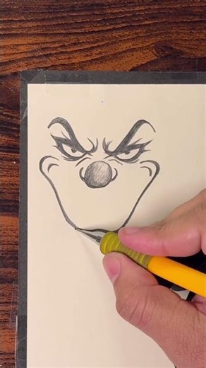 Simple drawing of a clown to make on the cover of the school notebook and make it insane