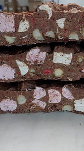 Toast to perfection with our Raspberry Rocky Road - a mix of fruity, nutty, and chocolatey goodness! 🤤🍫 Get yours here: https://poppyschocolate.com.au/products/raspberry-rocky-road Ships Australia wide with free shipping over $149 | Poppy's Chocolate