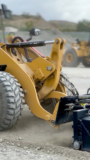 This attachment though... 💛 Check out this Power Box Rake. Antonio is showing how it can be fitted onto the 906 Compact Wheel Loader.It’s ideal for a whole bunch of landscaping applications, including removing old lawns, preparing seed beds, grading, levelling, prepping gravel areas and a whole lot more.#meetthefleet #dirtlife #landscaping #landscapinglife #catequipment #heavyequipmentlife #cat906 #worktools #compactwheelloader #heavyequipmentoperator #operatorlife #eventvenue #customerexperien