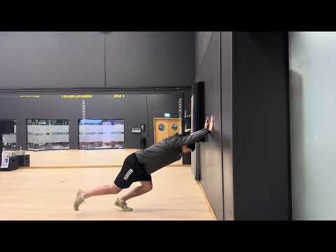 WALL ASSISTED KICKBACK INTO KNEE DRIVE