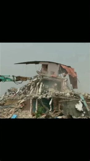 Dozers run on 5-story buildings in Manohara#news#balen##ytshorts #trending.