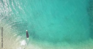 Woman on paddleboard. Beautiful woman in bikini riding a paddleboard.