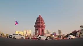 Phnom Penh, Cambodia - 16th March, 2024: Zoom in Time Lapse of the Independence Monument in Phnom Penh and Vehicles in Traffic on Stock Footage - Video of timelapse, tourism: 320524258