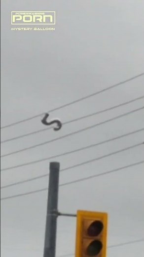 Mystery balloon gets stuck on power lines!