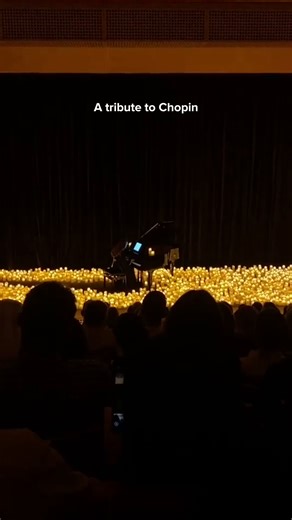 Chopin’s Nocturne in C-sharp minor fills the room, every note glowing under thousands of candles 💛 Who would you bring to experience this live? https://bit.ly/DiscoverCandlelightConcerts | Candlelight Concerts by Fever