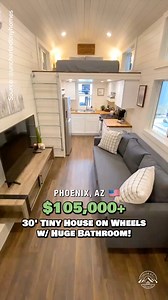 Would you live in this 30' tiny house on wheels? What would you change or add? Inside, you'll find a beautiful L-shaped kitchen with apartment-size appliances; a living room with space for a couch & TV; a large bathroom with a washer & dryer, a tile shower, & a small closet; a bedroom loft; & a bonus office/storage loft! Built by Uncharted Tiny Homes in Phoenix, AZ starting at $105,000 🏡 #tinyhouse #tinyhome #tinyhouseonwheels #smallhouse #smallspace #tinyhomes #housedesign #hometour #RV #tinyl