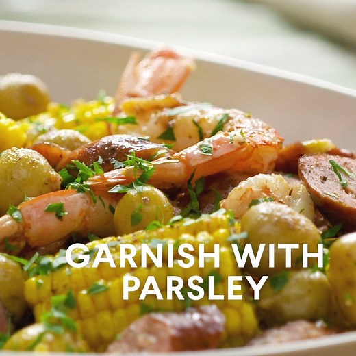 Our take on a seafood boil involves shrimp, sausage, corn and potatoes with a savory butter sauce—in the oven. Full recipe: https://aol.it/2KGNIeW | Yahoo