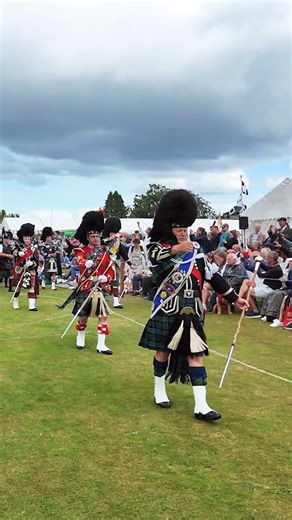 Saturday 2nd August 2025 Aboyne Highland Games returns to the Green in Deeside, Aberdeenshire, Scotland. These wonderful Games are one of north-east Scotland’s leading traditional events, which attracts thousands visitors from Scotland and around the world. Here are the massed Pipes and Drums starting their afternoon march during the 2024 Aboyne Games, led by the Drum Majors, with leading Drum Major Bill Barclay showing his impressive Mace flourish (spins and throws) skills. The bands were playi