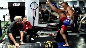 Spine and biomechanics expert Dr. Stuart McGill examining how elite MMA fighters generate power! "Evidence of a Double Peak in Muscle Activation to Enhance Strike Speed and Force: An Example With Elite Mixed Martial Arts" - McGill et al. (2010) Five elite mixed martial arts athletes were recruited. Muscle activation using electromyography and 3-dimensional spine motion was measured. A variety of strikes were performed. Results: "An initial peak was timed with the initiation of motion presumably 