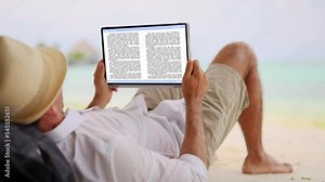 Man Reading E-book On Tablet