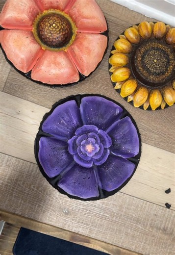 Turning this stepping stone I made from a dollar store veggie tray into a purple flower. I really just painted this one and had fun instead of making it a super specific flower and I really like how it turned out. I think our collection is starting to look really good 🥲 #steppingstone #garden #diy #flower #painting