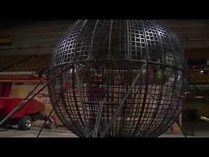 Stunt riders perform 'globe of death' at Tripoli Shrine Circu