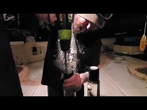 How to remove an alpha security cap from a bottle of alcohol