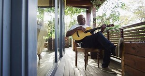 clip-1075201256-thoughtful-african-american-senior-man-sitting-on