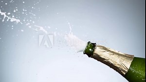 Super slow motion of Champagne explosion, opening champagne bottle closeup. Filmed on high speed cinema camera, 1000fps