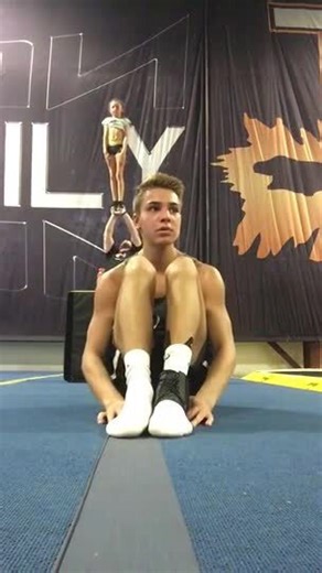 Guy Practicing Backflips Bumps Into Gym Mat Behind Him