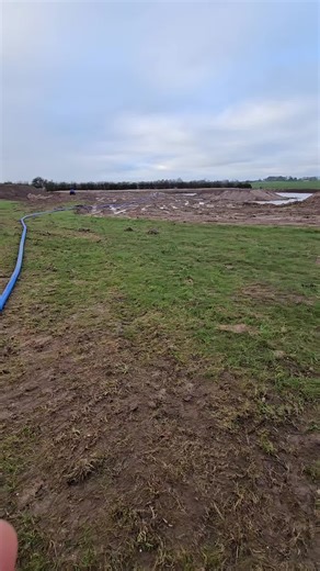 Bailing out the rainwater to fill our wildlife pond.. #carplake #fishinglake #lakebuild #fyp #lake