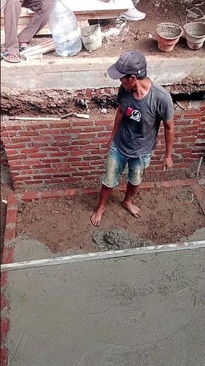 plastering the base of the floor using thick cement mortar.