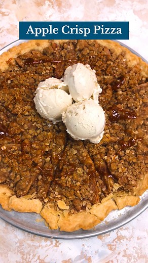 This Apple Crisp Pizza dessert recipe is a little slice of heaven! Full recipe here: bit.ly/3THOb3o | Taste of Home