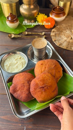 Sandra on Instagram: "Mangalore Buns ❌❌No Repost❌❌ Ingredients • 2 ripe bananas (I used Robusta) • ¼ cup curd • 3 tbsp sugar • Salt, to taste • ½ tsp baking soda • 2 cups maida (all-purpose flour) • jeera • Oil, for frying • Little oil or ghee, for resting the dough Method 1. Peel and break the bananas into a bowl. 2. Add curd and sugar, then mash everything well using a fork or masher until smooth. 3. Add jeera ,salt, and baking soda. Mix well. 4. Now add the maida and gently knead to form a so