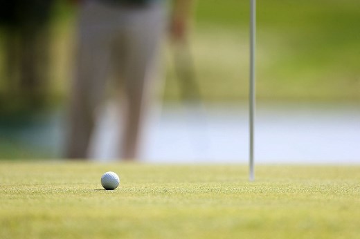What does ‘pin high’ mean in golf?