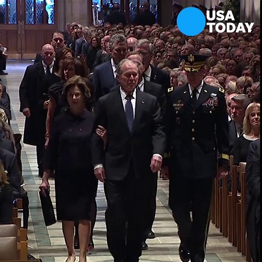 George W. Bush, Michelle Obama share another 'mo-mint' at funeral
