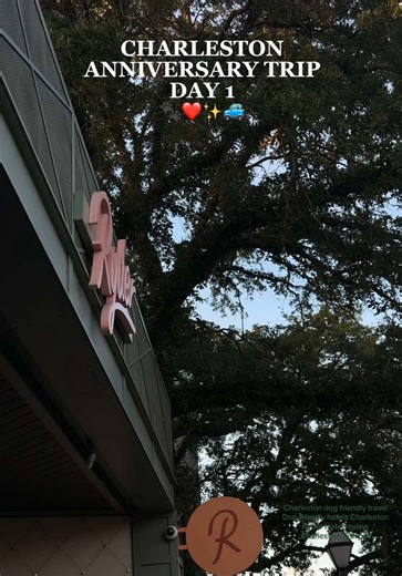Charleston for anniversary day 1!! Snow came with us. 🐾✨ We kept seeing Charleston listed as one of the most dog-friendly cities in the U.S., and honestly… they weren’t lying. We checked into @The Ryder and somehow ended up in the dreamiest room overlooking the courtyard filled with Christmas trees. They even surprised us with champagne for our anniversary. 🥹🤍 After a 7-hour drive, we grabbed a drink downstairs, then took Snow for the prettiest sunset walk to pineapple fountain, the pier, the