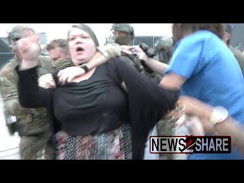 ICE arrest, and fire riot weapons against protesters attempting to block vehicles in Broadview, IL