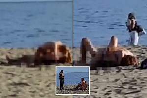 Brazen moment beachgoers are caught having sex on public beach in California