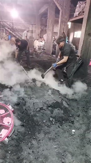 Removal Of Cast Iron Manhole Covers From Sand Casting Molds