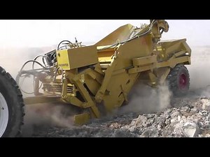 Rock Picker DSR-4 working with large rocks in China