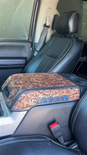 Custom center console done by @Colten Miller DM him for custom leather items like wallets,hat clips, belts, and center consoles.#fyp #f250#tooledleather
