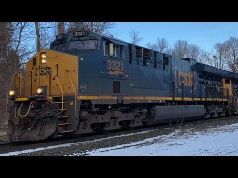 CSX M439/17 passes CP57 pulling over the summit at low throttle