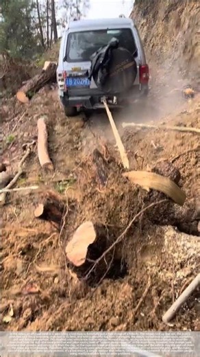 An off-road vehicle stepped on the gas and pulled up a tree stump.