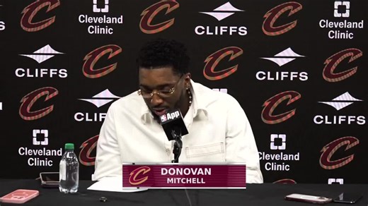 Donovan Mitchell on video game with fan