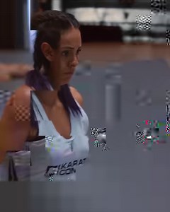 What a headkick, it knocked her out cold then the punch on the way down woke her back up. | Karate Combat