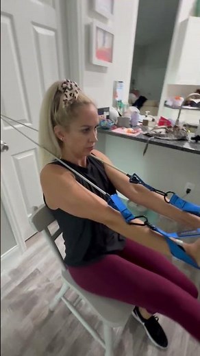 Seated band chest fly with leg extension