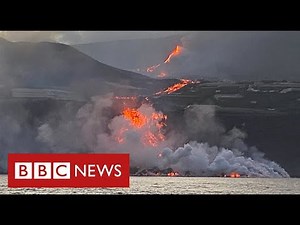 Toxic gas fear as Spanish volcano lava reaches ocean - BBC News