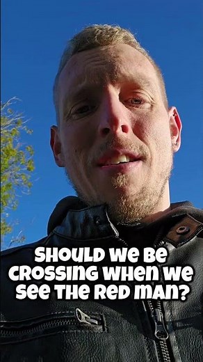 The Green Cross Code. Should we be crossing the road when we see the red man or should we wait?
