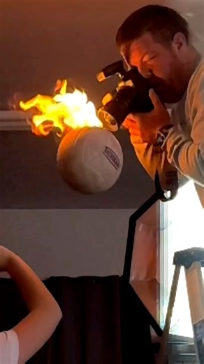 962K views · 15K reactions | Photographer gets way too close to volleyball on fire. | SBJ Studios | Facebook
