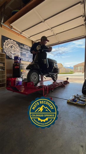 From Wrench Therapy to Wind Therapy 🔧➡️🌬️ Time lapse swap. The Genuine Stella comes off the lift, one of our Wrench Therapy projects, and the Triumph Scrambler 400X “Shadow” goes on for annual service and an oil change. Shadow lives in our garage thanks to its owner from England and supports our Wind Therapy program while he’s not in the US. It’s also available on Riders Share. Do you need a lift for basic maintenance? No. Does it make it easier at eye level? Absolutely. Moto Recovery’s DIY ga