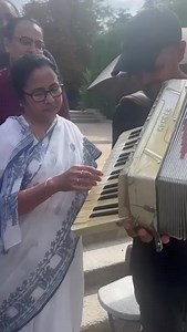 1M views · 9.4K reactions | Our Didi engaging in a sweet encounter with a street musician and his accordion on the streets of Madrid. #TrinamooleNaboJowar #MamataBanerjee #Spain | Trinamoole Nabo Jowar | Facebook