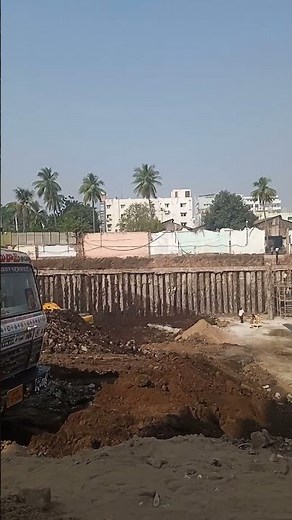 Contiguous pile wall supporting deep excavation