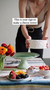 Fall into Fromage from Europe 🇫🇷 🧀 This gives a whole new meaning to the term "dessert cheese course." French cheese is a great way to elevate your holiday gatherings! You could keep it to a simple cheese plate at the end of dinner, or really impress your guests with a full-on #cheesetower! The topper here is a wheel of Langress, a cheese that's specifically made for pouring champagne on. Go to the link in our bio to learn more about these decadent French cheeses and where to find them near y