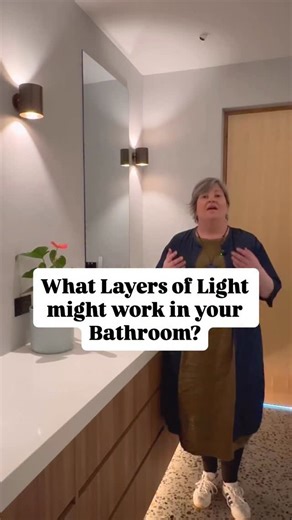 Architectural LIGHTING DESIGN on Instagram: "Lighting a bathroom is about creating layers of light, and thinking about how you want to feel and function in the space, not how anyone else uses theirs. Just as important is the ability to adjust those layers, using separate switching to suit different moments throughout the day. In this family bathroom, a faux skylight gently washes the shower with soft light, drawing out texture and creating a sense of calm. Decorative wall lights add a moment of