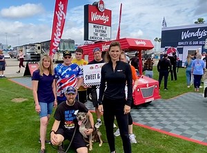 Jamie Little on Instagram: "Here’s a little behind the scenes from our shoot with Wendy’s today! Met some great race fans (and a pup) representing #TeamHeat!"