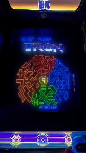 Till Paris on Instagram: "TRON, a 1982 Classic Arcade Favorite! TRON, the 1982 arcade game, was a groundbreaking experience inspired by the sci-fi movie of the same name. Combining vivid neon graphics and unique gameplay, it brought players into the digital world of light cycles, tanks, and grid bugs. Each level was a test of reflexes and strategy, making it a challenging yet mesmerizing game. TRON stood out for its futuristic visuals and the immersive feel, capturing the imagination of 80s game