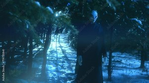 Creepy alien standing in snowy forest during the night and staring in the dark. Ufo light beams shining through trees from behind