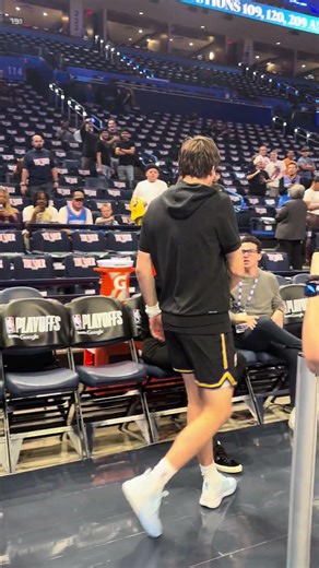 University of Oklahoma alum Austin Reaves walks onto the court for the Lakers ahead of Game 2